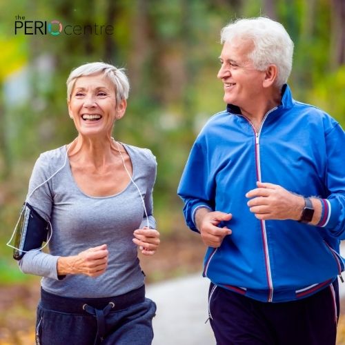 older woman and man with healthy smile and gums from periodontal care in Oshawa